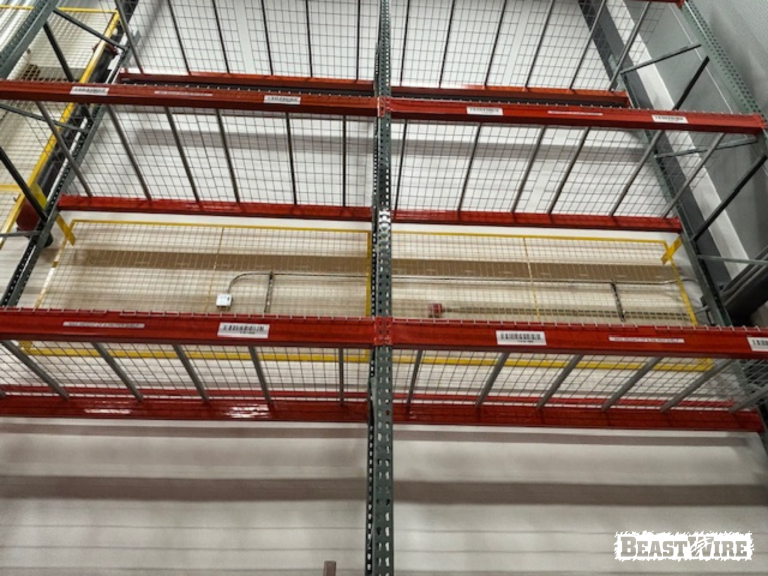 BeastWire® Pallet Rack Backing panels installed to shield exposed utilities.