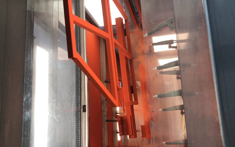 SpaceGuard Finishing Solutions - Powder Line - Red Spray Guns on Handrail