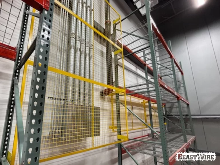 BeastWire® Pallet Rack Backing panels installed to shield exposed utilities.